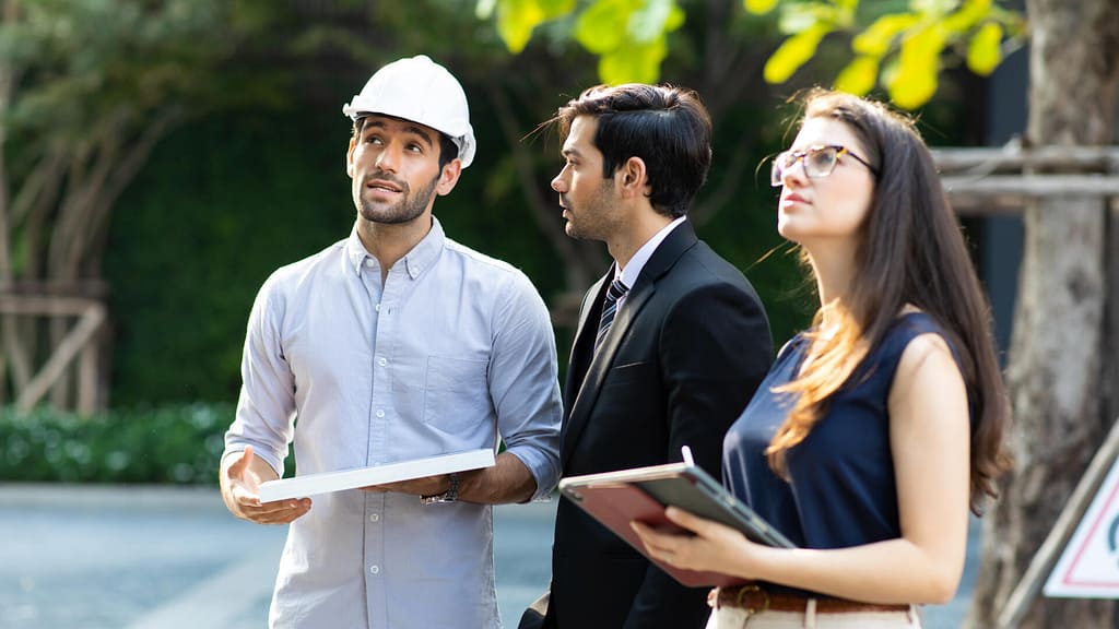 three people discussing solar leasing