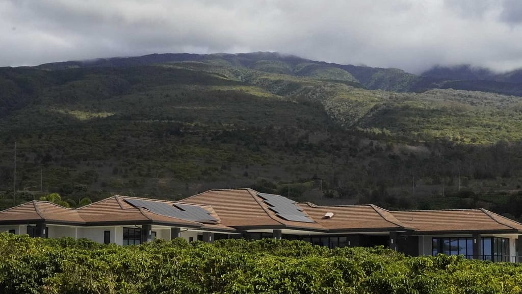 houses with solar panel over mountain view